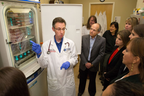 Dr. Joshua Schiffman, Pediatric Oncologist from Primary Children’s Hospital and Investigator with Huntsman Cancer Institute, both located in Salt Lake City, UT, discusses how the DNA is studied at his laboratory at the Hunstman Cancer Institute with Roseanne Robinson, Senior Lab Specialist; Kenneth Feld, Chairman and CEO of Feld Entertainment; Dr. Wendy Kiso, Ringling Bros. and Barnum & Bailey research and conservation scientist; Dr. Lisa Abeggel, Research Associate; Nicole Feld, Executive Vice President of Feld Entertainment; Alana Feld, Executive Vice President of Feld Entertainment; and Bonnie Feld. (Photo: Feld Entertainment)