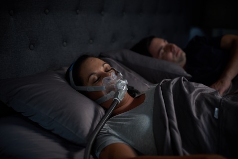 Woman wearing AirFit F30 in bed (Photo: Business Wire)