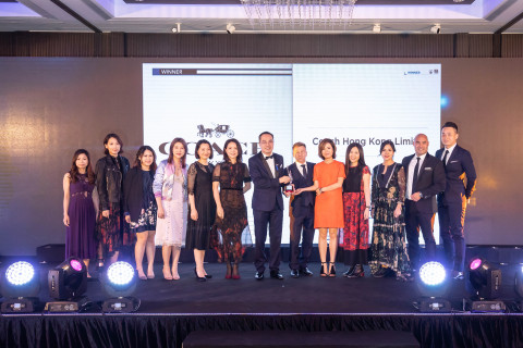 COACH Hong Kong staff at HR Asia awards presentation ceremony with William Ng, Group Publisher/Editor-in-Chief of Business Media International (Photo: Business Wire)