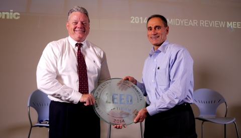 Panasonic Corporation of North America CFO Mike Riccio (photo right), who led the company's effort to secure LEED certification, presents the LEED Platinum plaque to company Chairman & CEO Joseph M. Taylor (left). The plaque will be installed in the building lobby to remind employees and visitors of Panasonic's aim to maintain the highest eco standards. (Photo: Business Wire)
