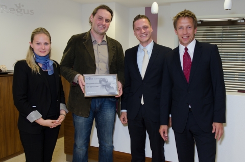 Boris Konau our 1.5 Millionth customer with Christian Schmidt and his local centre team, Georg Rudtke and Mona Olrogge (Photo: Business Wire)