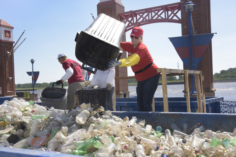 In 2017, employees from Heartland Coca-Cola Bottling Co. joined with other volunteers in St. Louis to collect and sort 14,480 pounds of debris; 63 percent was diverted for recycling. Coca-Cola then partnered with manufacturer Phoenix Technologies to convert plastic bottles into recycled PET plastic for use in new bottles. (Photo: Business Wire)