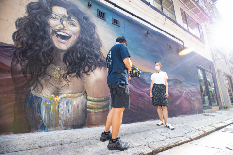Super Fan Alexandra Unrein shares her favourite street art, live from Shin Hing Street in Central (Photo: Business Wire)