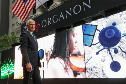 Organon's CEO Kevin Ali in front of 