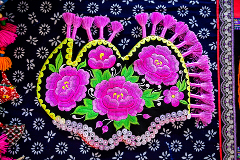 Close up view of a hand-stitched piece of Yi Embroidery. (Photo: Courtesy of Waipula Villagers)