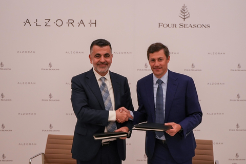 From left: George Saad, CEO of Al Zorah Development Company, and Adrian Messerli, Area President, Hotel Operations, EMEA at Four Seasons, during the signing of the agreement. (Photo: AETOSWire)