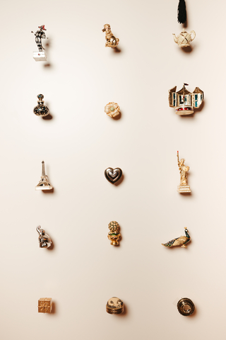 Estée Lauder solid fragrance compact wall – which includes 272 heritage compacts. Ranging from 1970s-2010s.