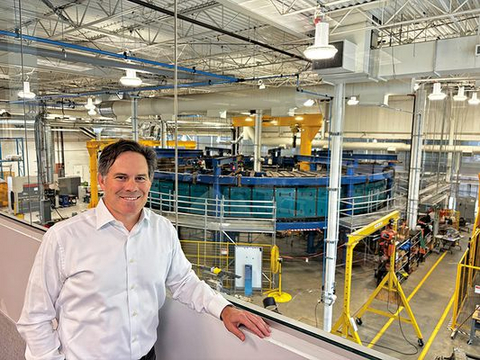 Scott Gardner, President, Svante Development, stands at Svante's headquarters in Burnaby, BC, Canada, in front of the company's commercial-sized carbon capture machine, 