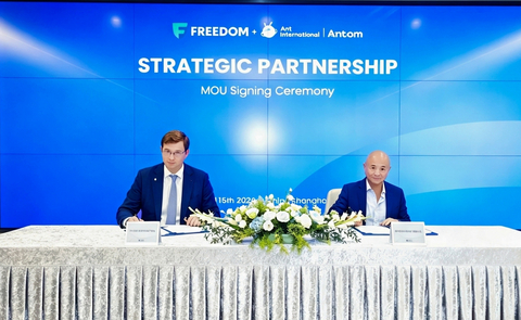 From left to right: Timur Turlov, CEO of Freedom Holding Corp., Leiming Chen, Senior Vice President and Chief Sustainability Officer of Ant International

