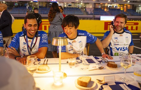 Yuki Tsunoda at La Tavolata by Barilla alongside members of the Visa Cash App Racing Bulls team.


