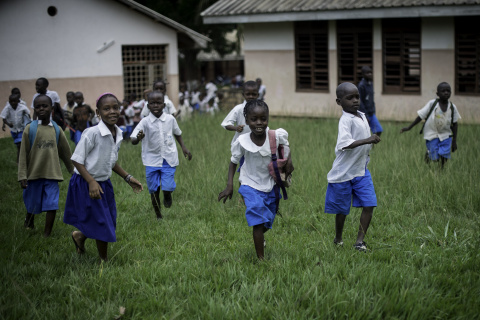 Students of SOS Children's Village Bangui run out of school at the end of classes (Photo: Business Wire)
